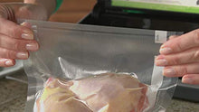Load image into Gallery viewer, FoodSaver FM2100-000 Vacuum Sealer Machine System with Starter Bags &amp; Rolls | Safety Certified, Black
