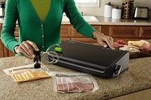 Load image into Gallery viewer, FoodSaver FM2100-000 Vacuum Sealer Machine System with Starter Bags &amp; Rolls | Safety Certified, Black
