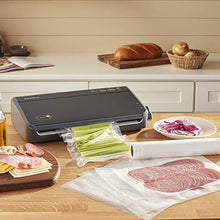 Load image into Gallery viewer, FoodSaver FM2100-000 Vacuum Sealer Machine System with Starter Bags &amp; Rolls | Safety Certified, Black
