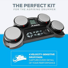 Load image into Gallery viewer, Alesis Compact Kit 4 – Tabletop Electric Drum Set with 70 Electronic / Acoustic Drum Kit Sounds, 4 Pads, Battery- or AC-Power and Drum Sticks Included
